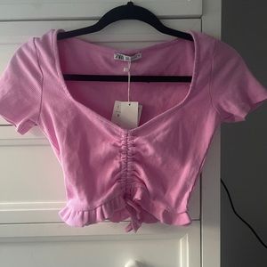 pink crop top